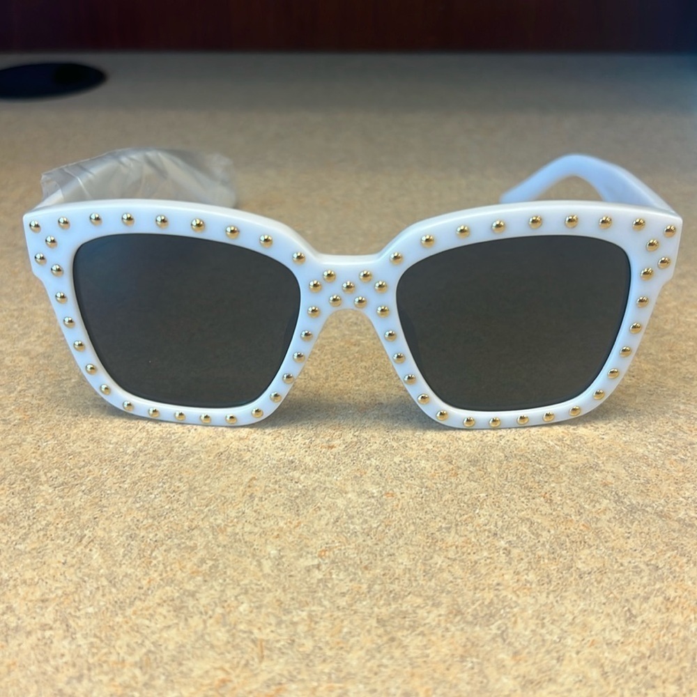 Greeksglasses White oversized sunglasses gold studs around frame, black lenses